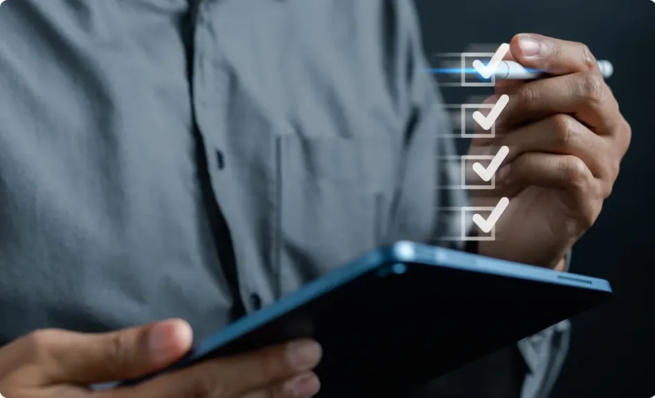 Filling in a checklist on a tablet